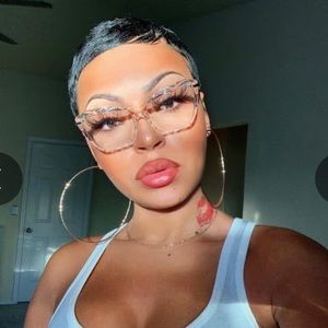 Fantastic Dolce and Gabbana clear and gold cat eye frames NIB